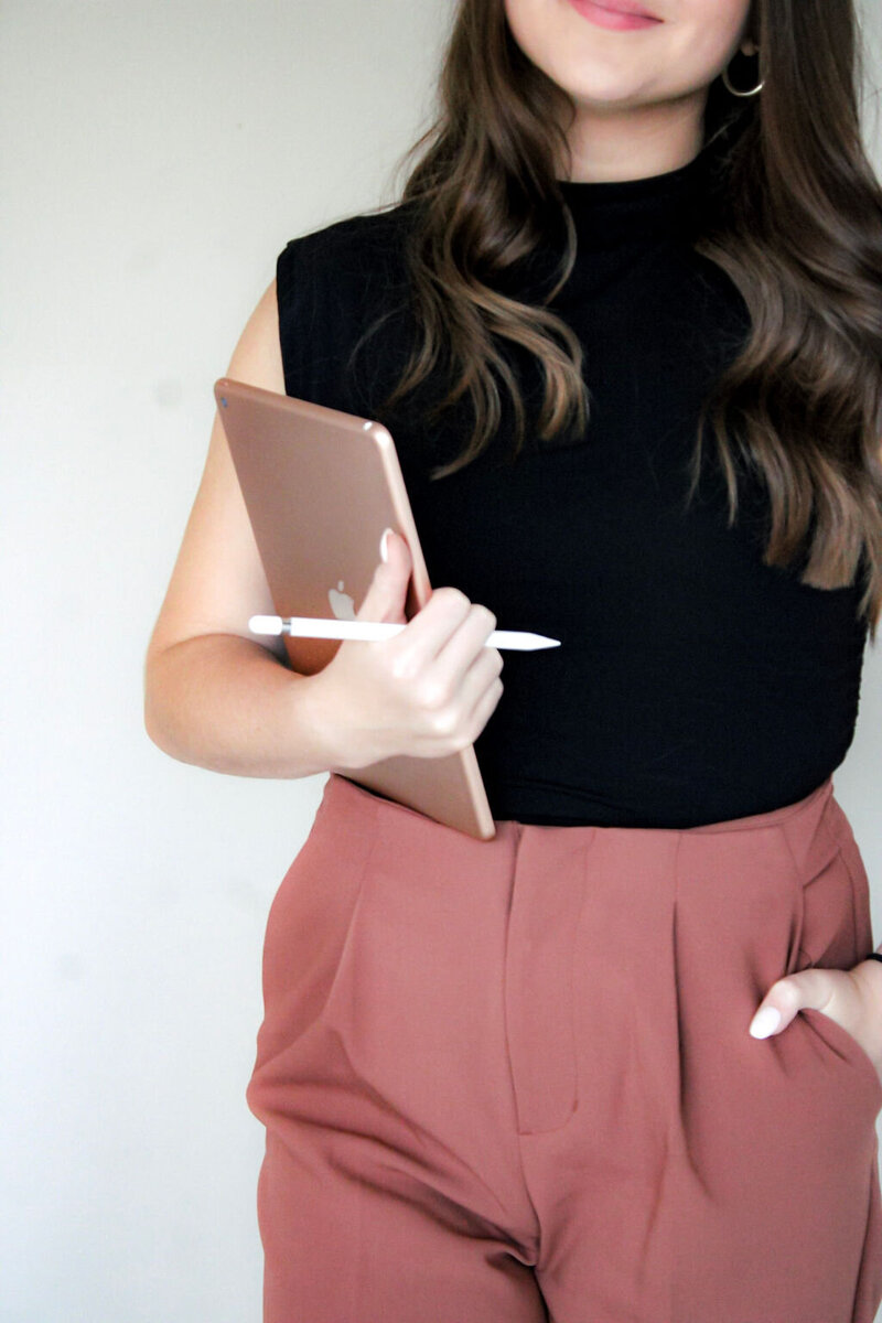 Leilah Holding a Tablet