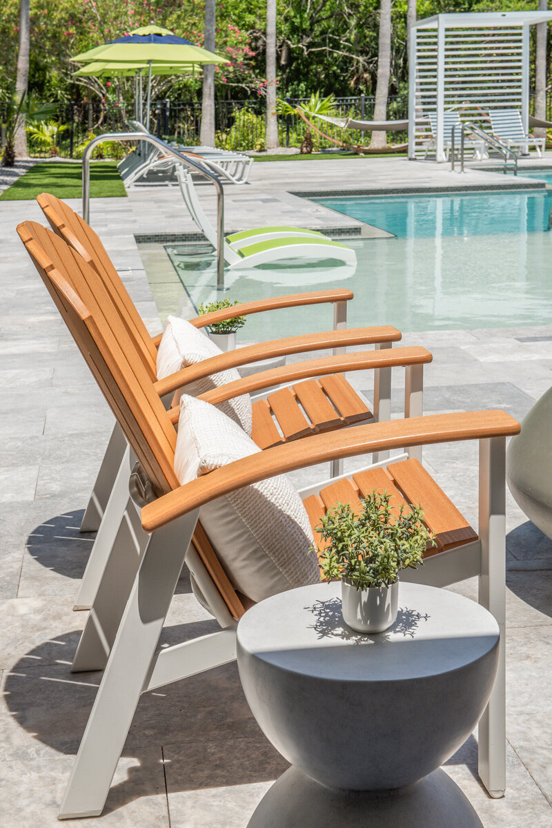 outdoor furniture around pool
