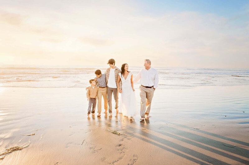 Rancho Santa Fe photographer, Tristan Quigley, captures a beautiful family portrait on the beach near Rancho Santa Fe