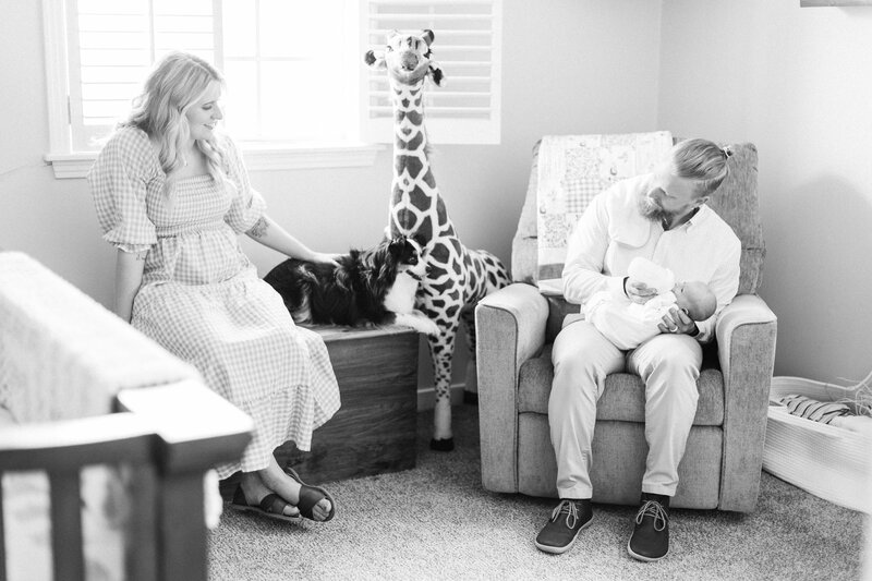 Kin and Shelby Mullins sitting with their baby