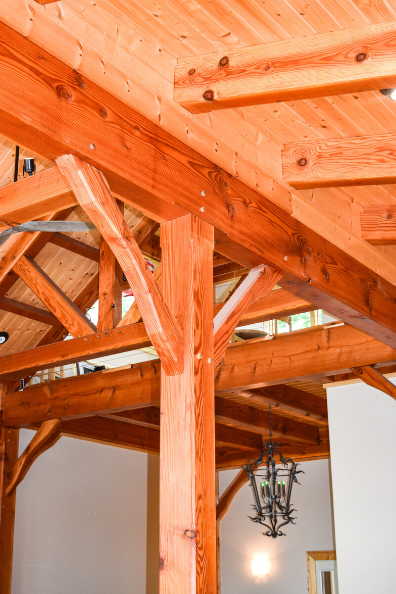 Post and beam, king post  truss timber frame home interior.