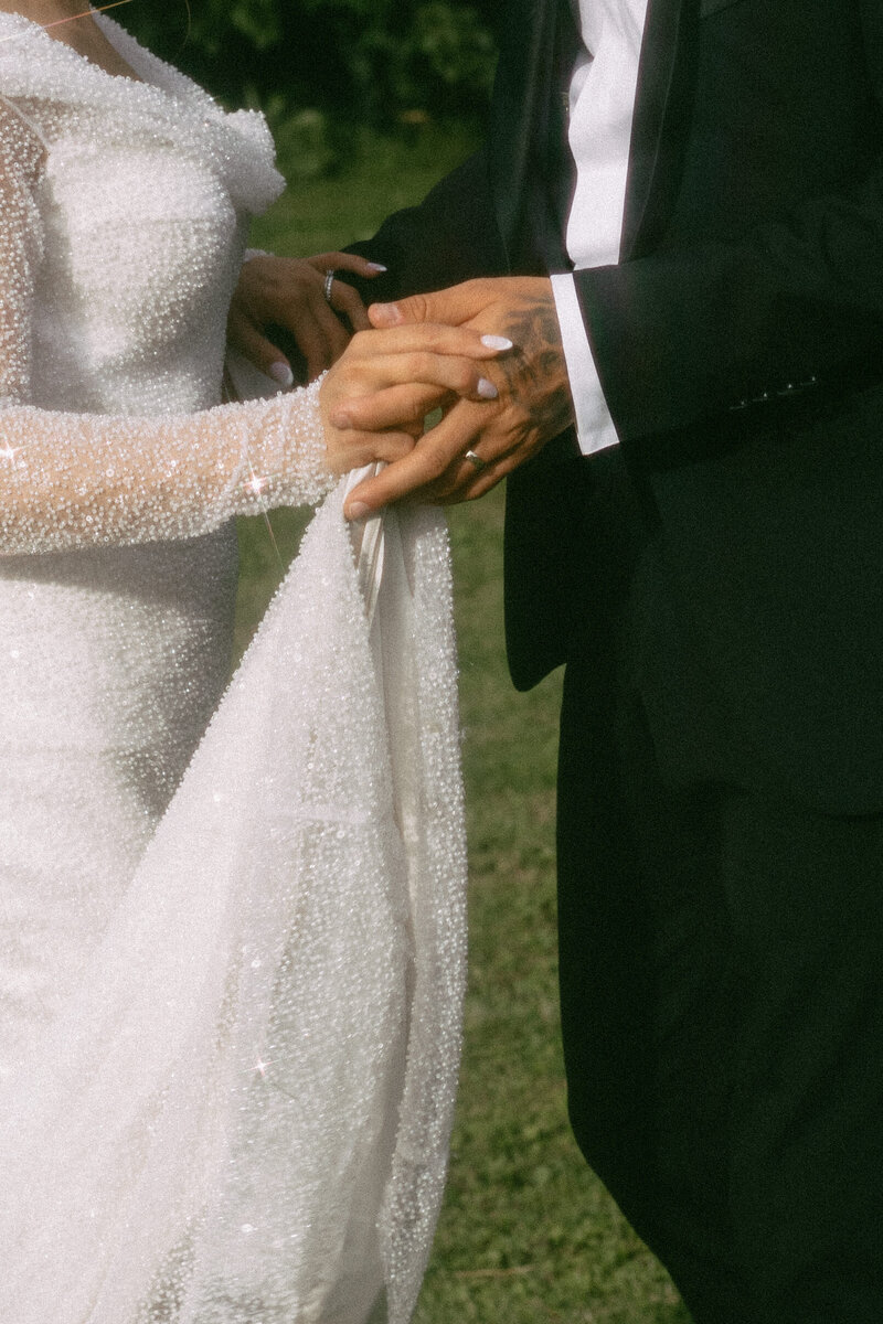 Luxury wedding in Europe – sophisticated bride in a modern wedding gown and groom in a timeless suit.