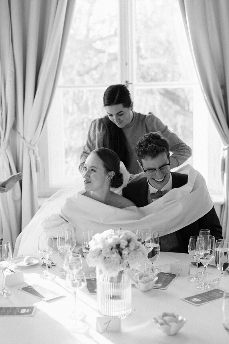 Luxury wedding in Europe – sophisticated bride in a modern wedding gown and groom in a timeless suit.