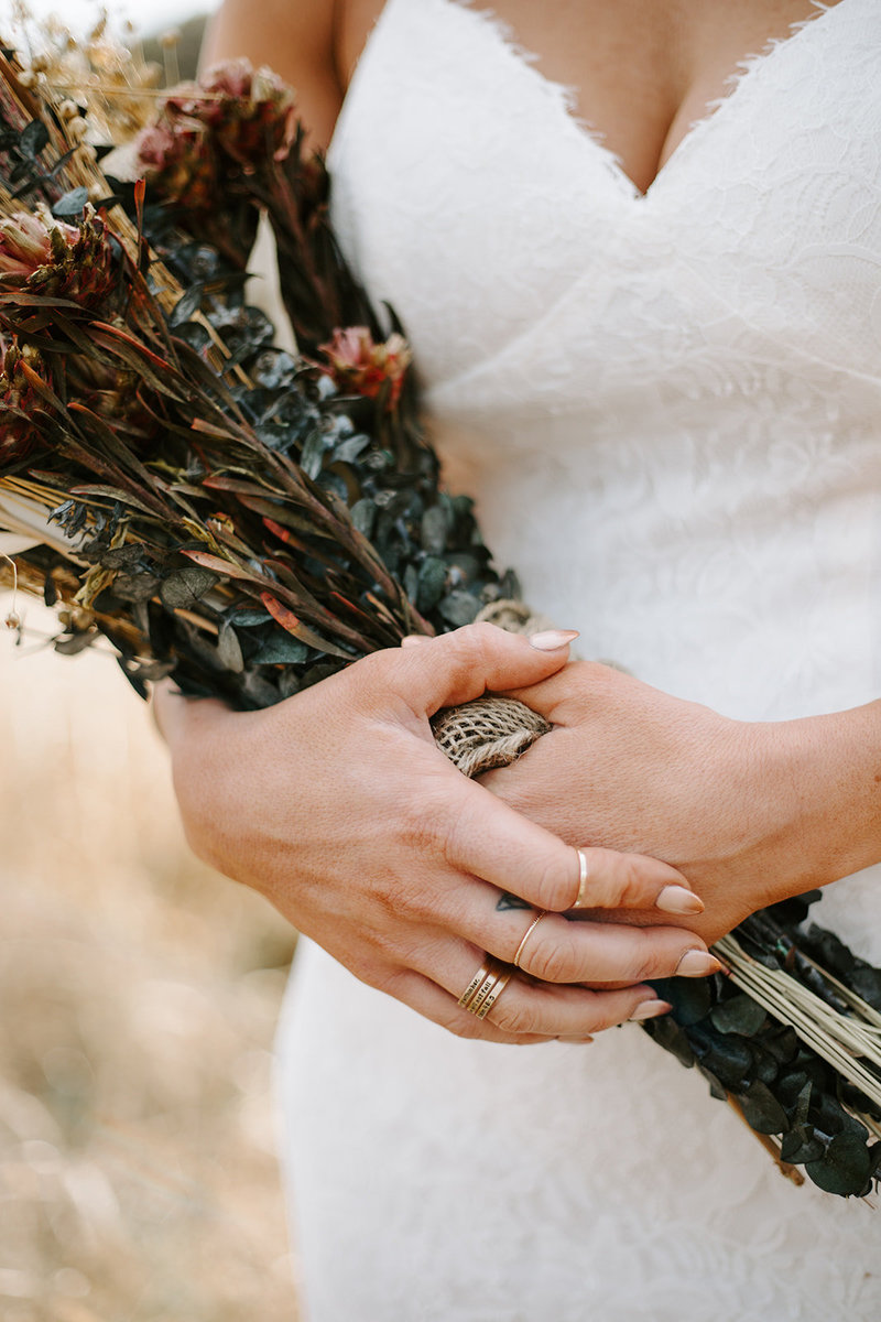 Close up shot of the brides hands holding her wedding bouquet on her Wisconsin wedding day