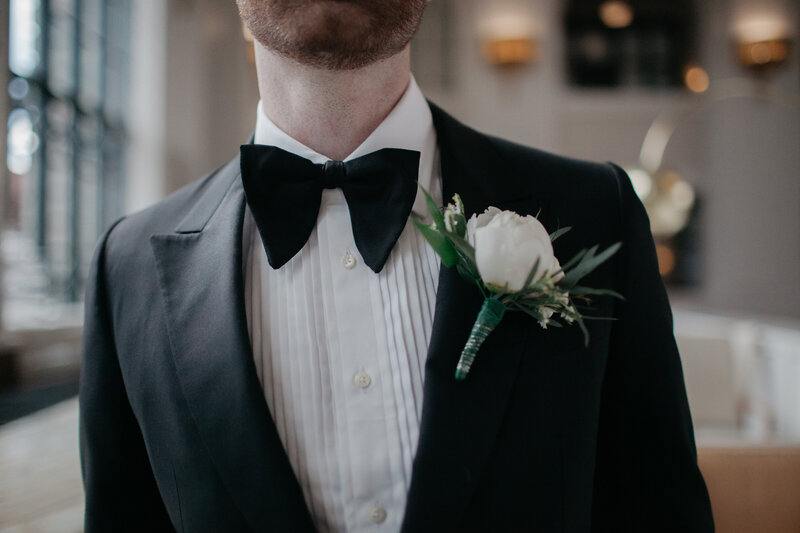 Up-close image of  bowtie on a black tux at Denver's Union Station