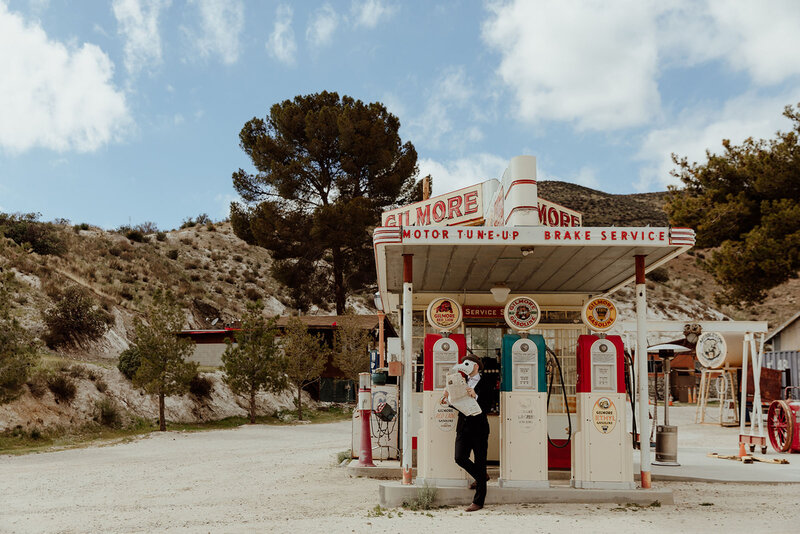 50s themed wedding venue in the desert featuring a retro gas station.