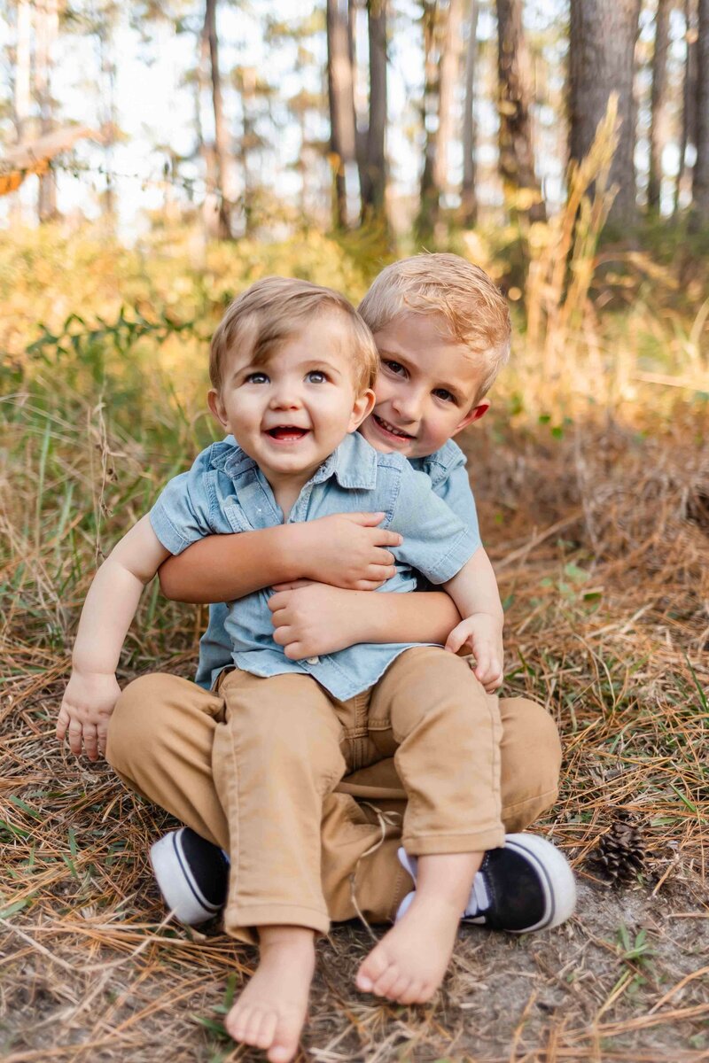 brothers in the woods in alabama, family photographer