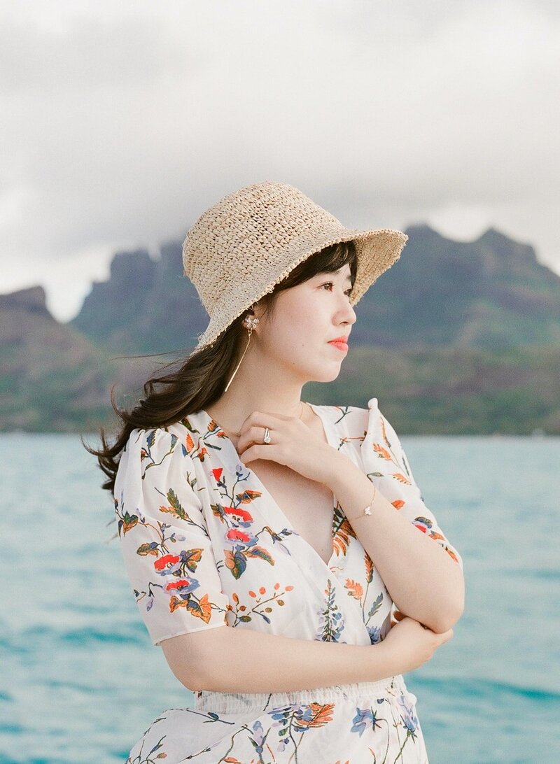 Intimate elopement, the bride with a hat, close portrait