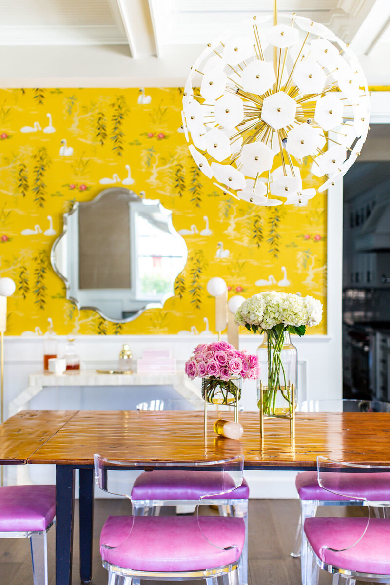 Yellow and pink dining room with Nina Campbell Swan Lake wallpaper