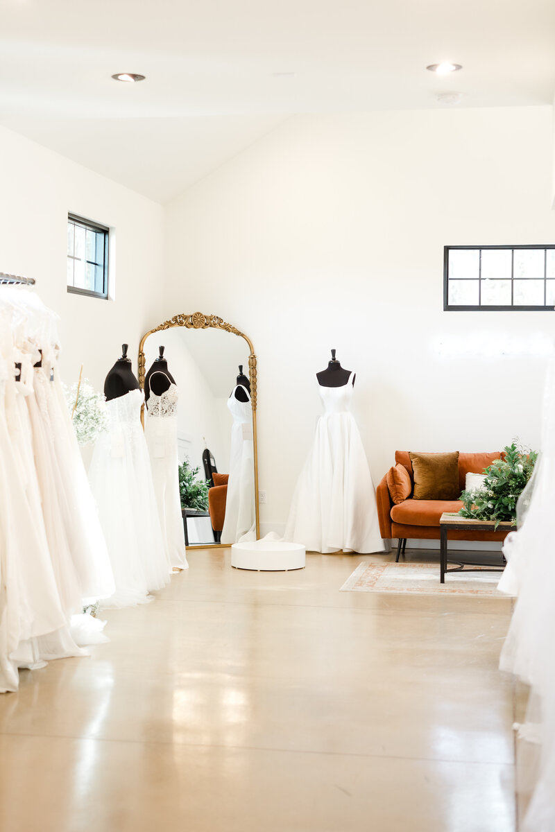 Cozy and elegant bridal boutique in central Virginia with racks of designer wedding dresses and accessories