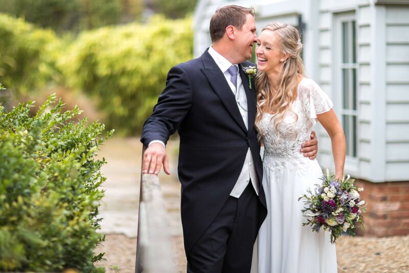 Bride and groom laughing