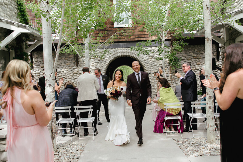 Newlyweds recess in the Surf Chateau courtyard at the Surf Hotel Buena Vista.