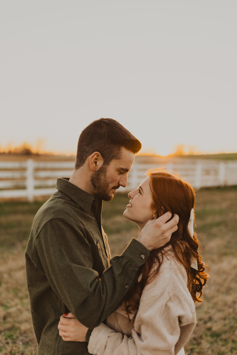 couple embracing while looking at one another