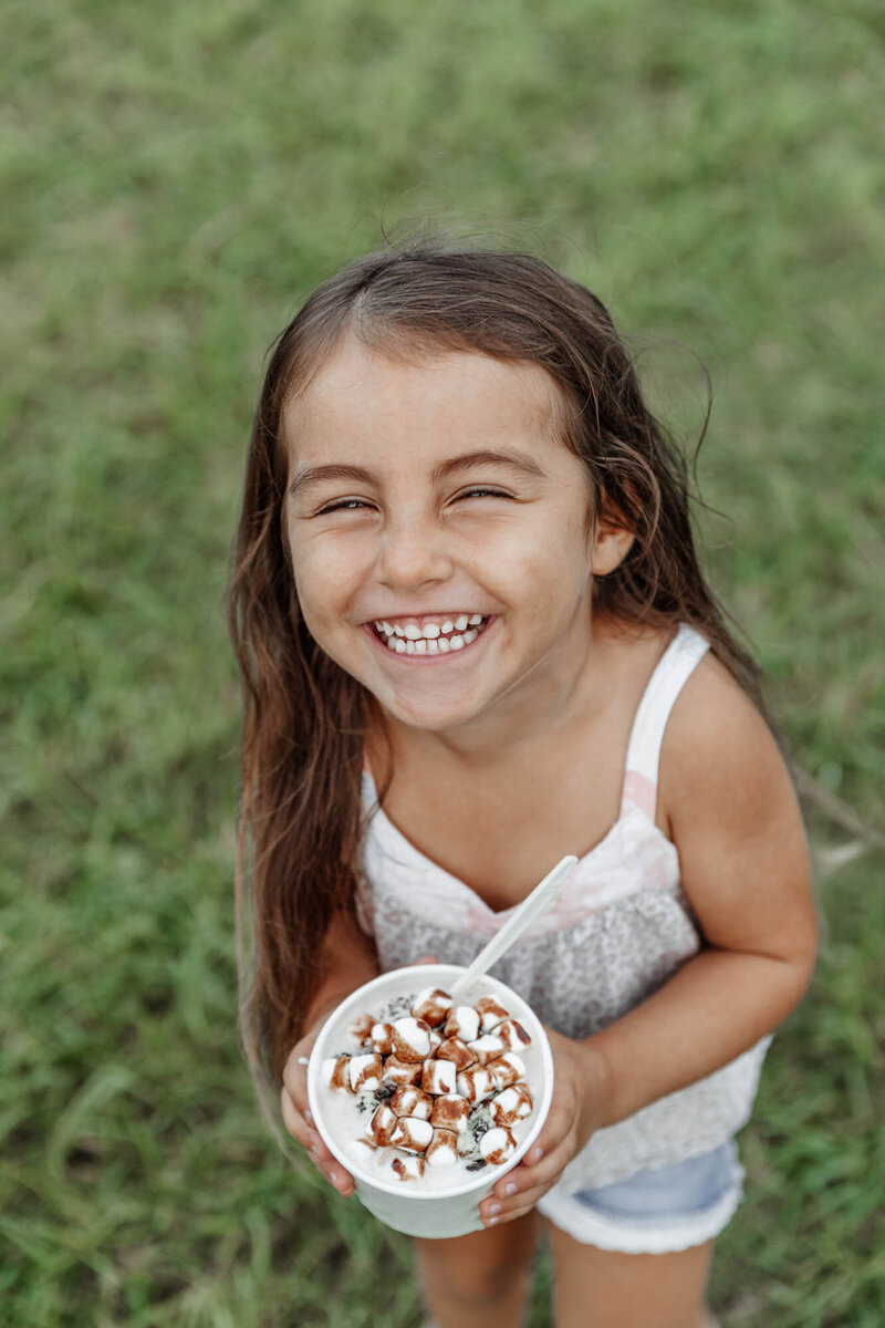 little-girl-smiling-with-frozen-yogurt
