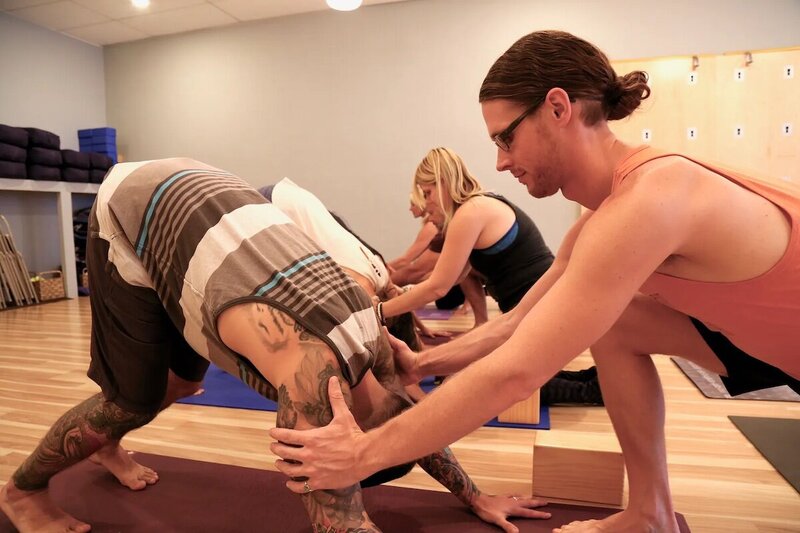 advanced-yoga-training-downdog-shoulder-assist