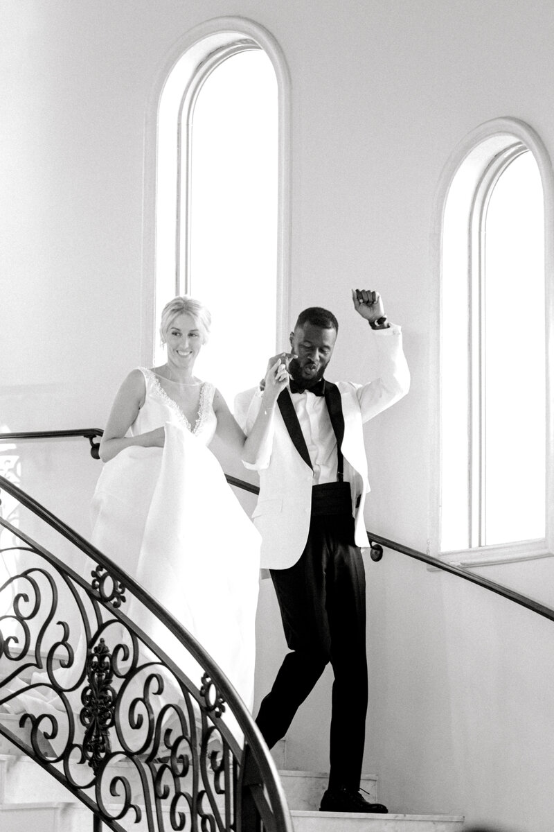 Swank Soiree Dallas Wedding Planner Kelci and CJ Knotting Hill Place - Bride and Groom on a grand staircase
