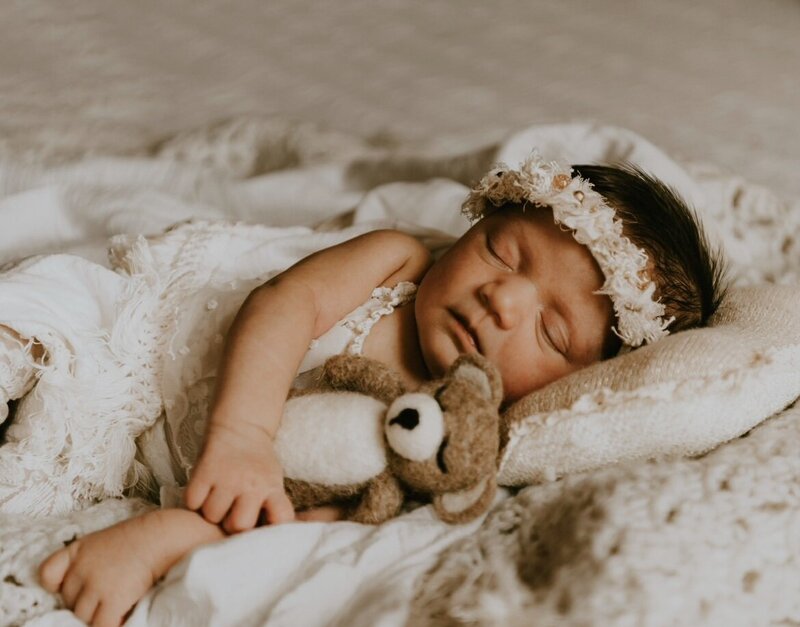 Newborn sleeps during studio session. 
