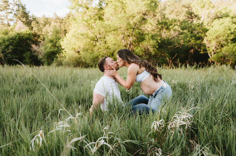 groom holding bride's face at los poblanos organic farm