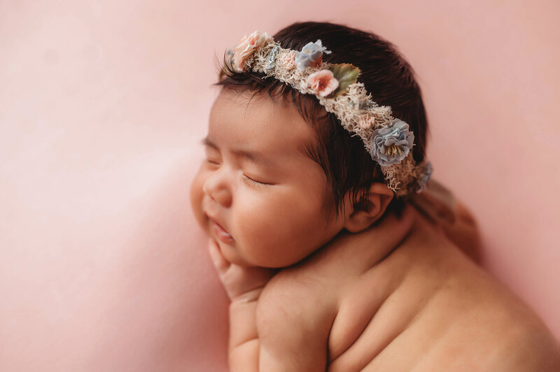 Newborn Baby posed for Newborn Photos in Asheville, NC.