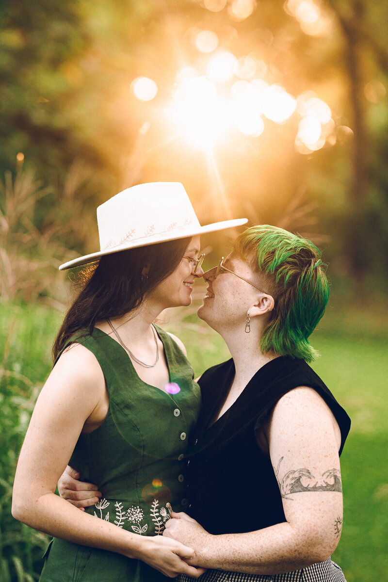A couple poses for sunset photos during their wedding reception at the Redfield Estate at The Grove in Glenview, Illinois