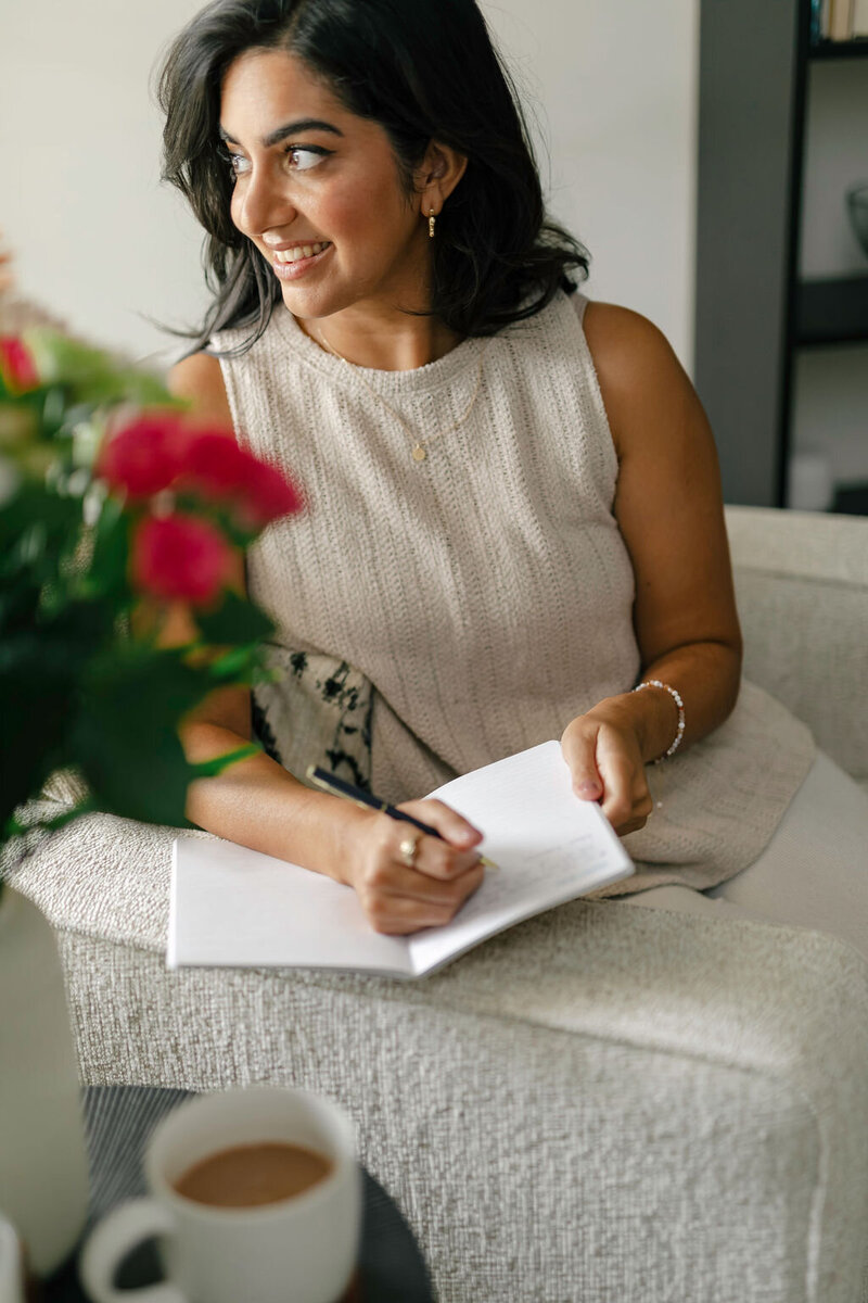 Woman Journaling At Home