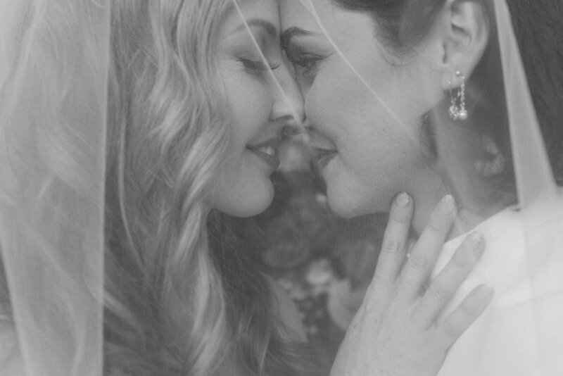 Brides Forehead to Forehead Under a Veil - Megan & Amber | The Ruins PNW Inspired Wedding Hood River Oregon – LGBTQ