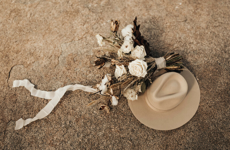 Detail photo of hat and bouquet