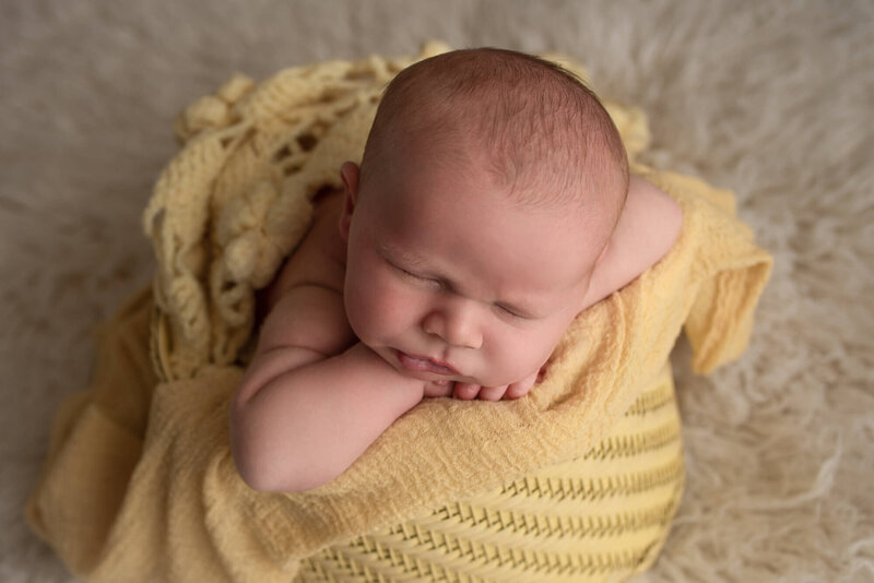 Milwaukee Newborn Photo baby sleeping in bucket in yellow | Glory Be Photo by Tara Bos