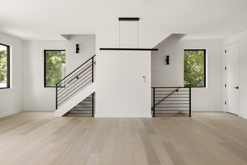 open floor plan for modern home with white oak floors