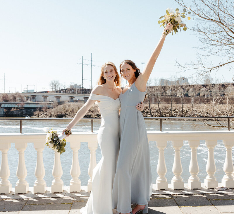bride and bridesmaid at wedding at Water Works, Philadelphia