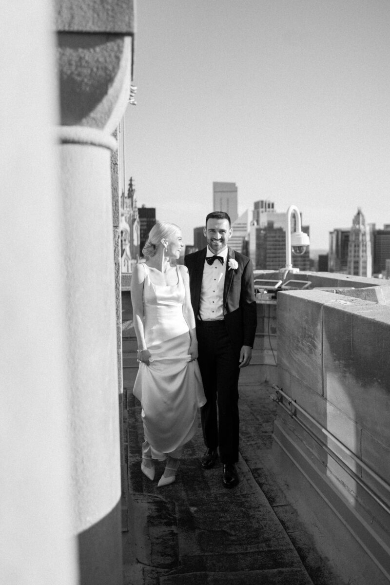 Groom kissing bride's hand, taken by chicago film wedding photographer Allison Francois