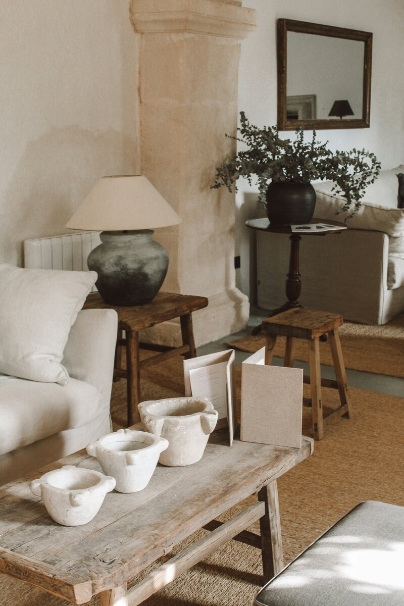 Rustic, homey living room with clay jars