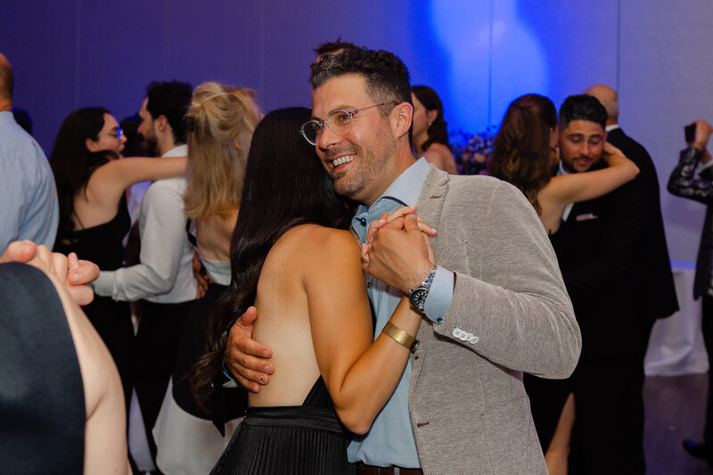 Ottawa wedding photography of guests dancing during a Chateau Le Parc wedding reception