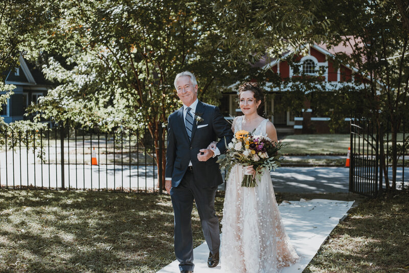 bride and father walking down isle