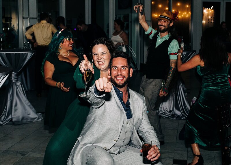 People dancing at birthday party, drinking and having a  good time