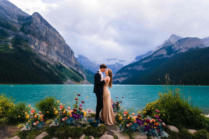 A couple kissing at Lake Louise during their elopement at Banff.
