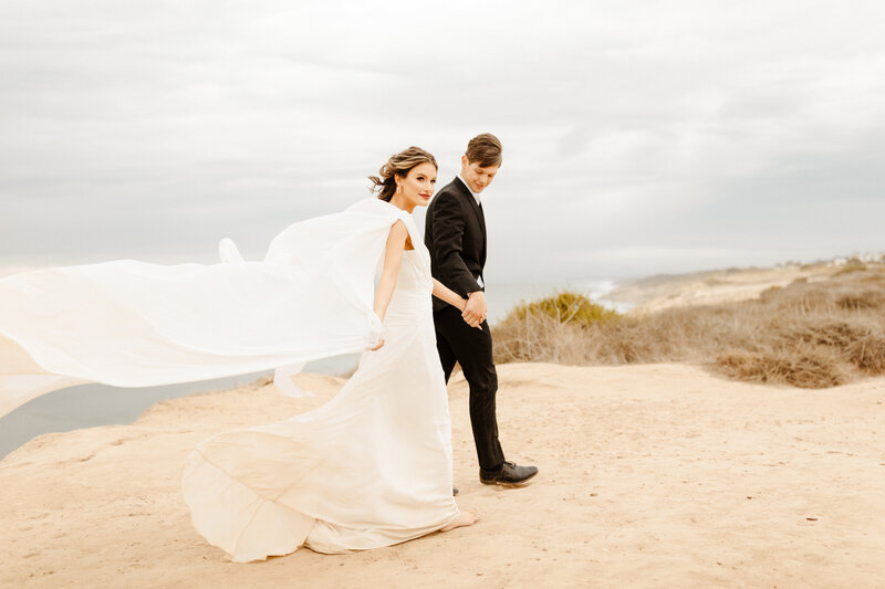 bride and groom at cliffside Laguna Beach elopement