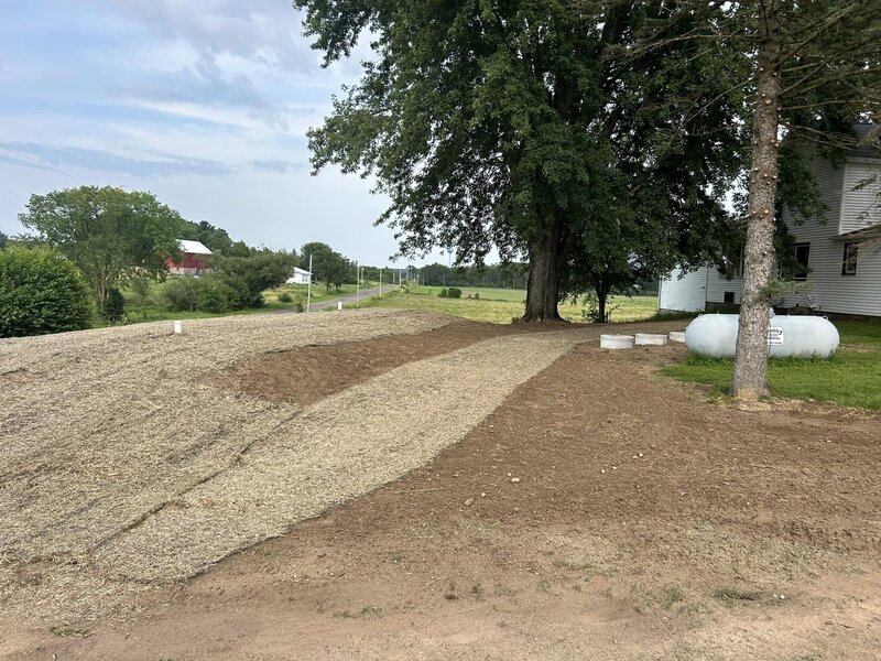 Septic drain filed next to a house