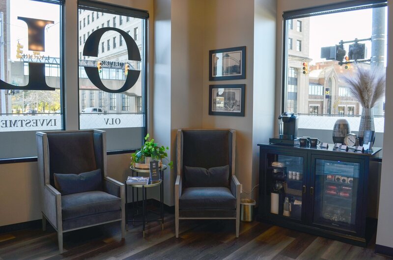 Waiting area with grey chairs