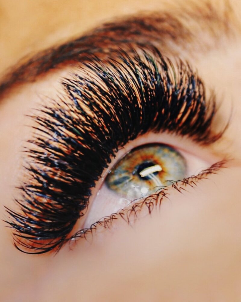 Close-up of mega volume lash extensions applied at Artistry by Jessica in Bethel, CT.