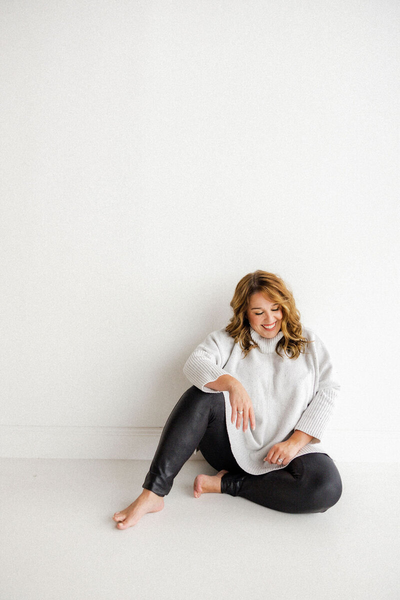 The Eventful Gals founder walking confidently with a bouquet in hand, known for planning elegant weddings across Jacksonville and Amelia Island.