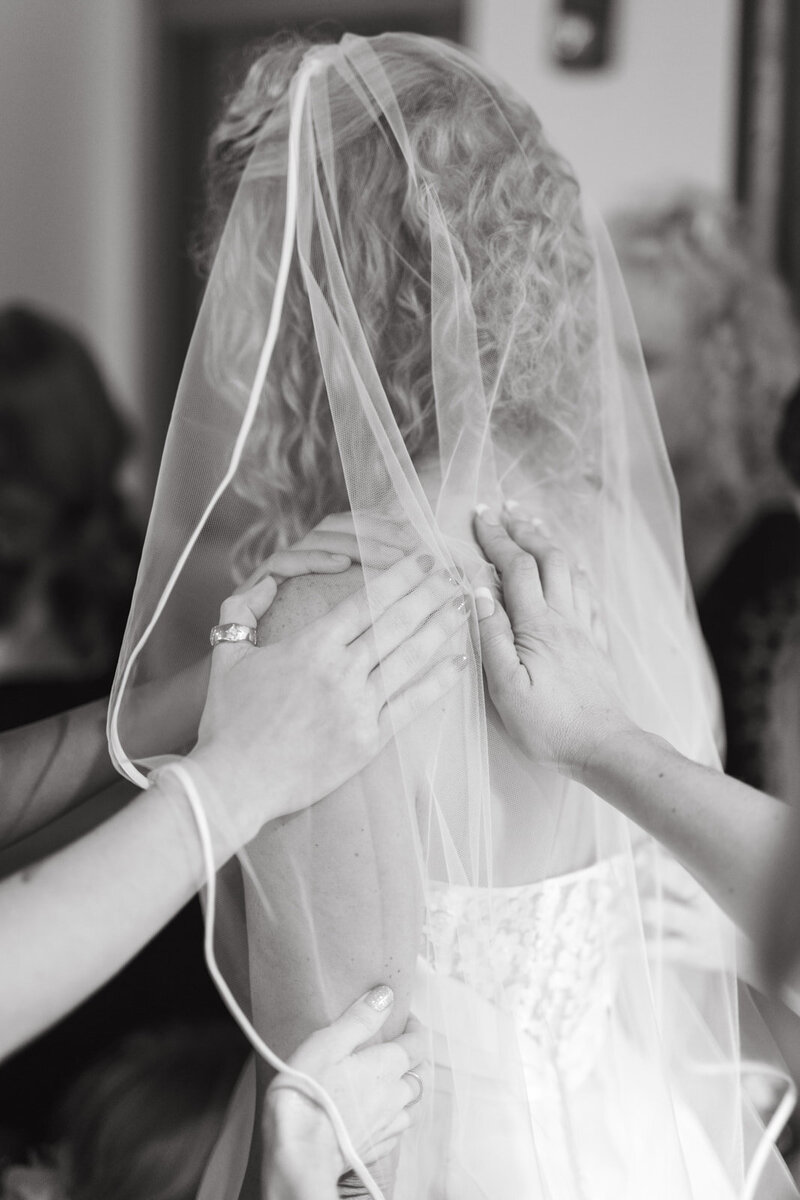 Wedding party praying over the bride in atlanta Photo Britt Stepp