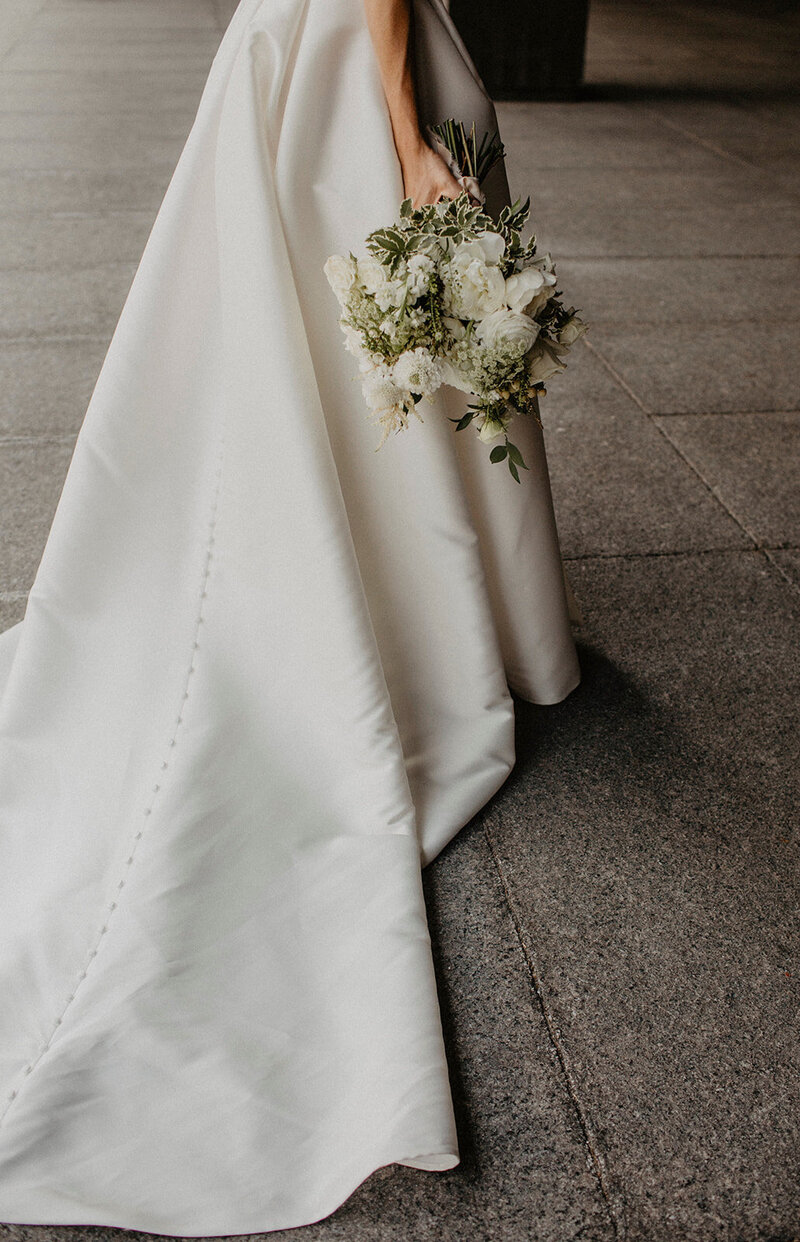 A Black-Tie Destination Wedding at Auberge St. Gabriel, Old Port Montreal - This stunning photo by Martine L Photography captures the elegance of a black-tie wedding held at the historic Auberge St. Gabriel in Montreal's charming Old Port. The image beautifully showcases the sophisticated ambiance, exquisite décor, and timeless romance of the event, reflecting the luxury and refinement of this unforgettable destination celebration.
