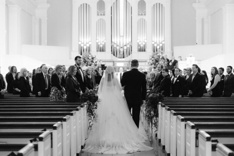 Bride walking down the aisle at Preston Hollow Presbyterian Church