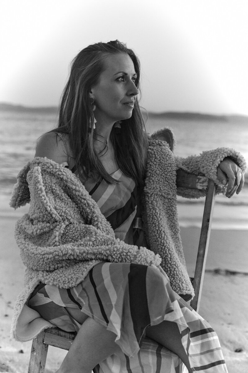 headsot of Ingrid photography at her studio in Terrigal with her cactus.