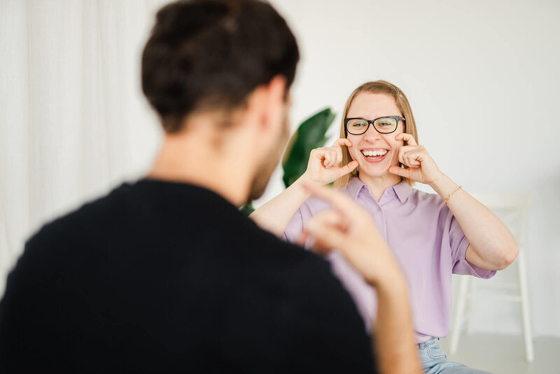 Accent coach Stephanie Pampel shows a student how wide to hold their mouth for a sound.