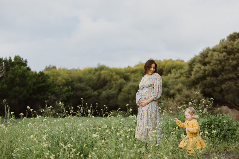 maternity shoot in a field