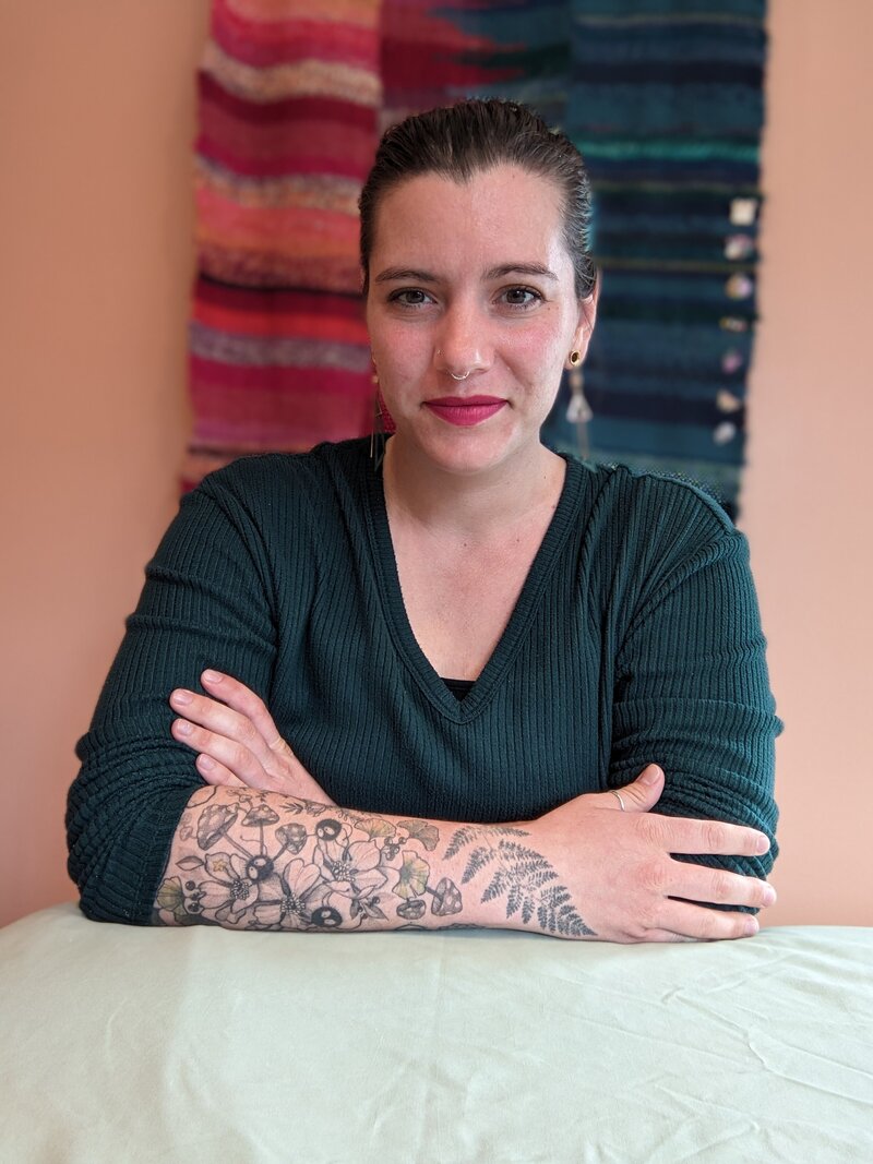 Julie Pokorny offering a gentle craniosacral therapy session, reflecting her integrative and heart-centered approach to healing.