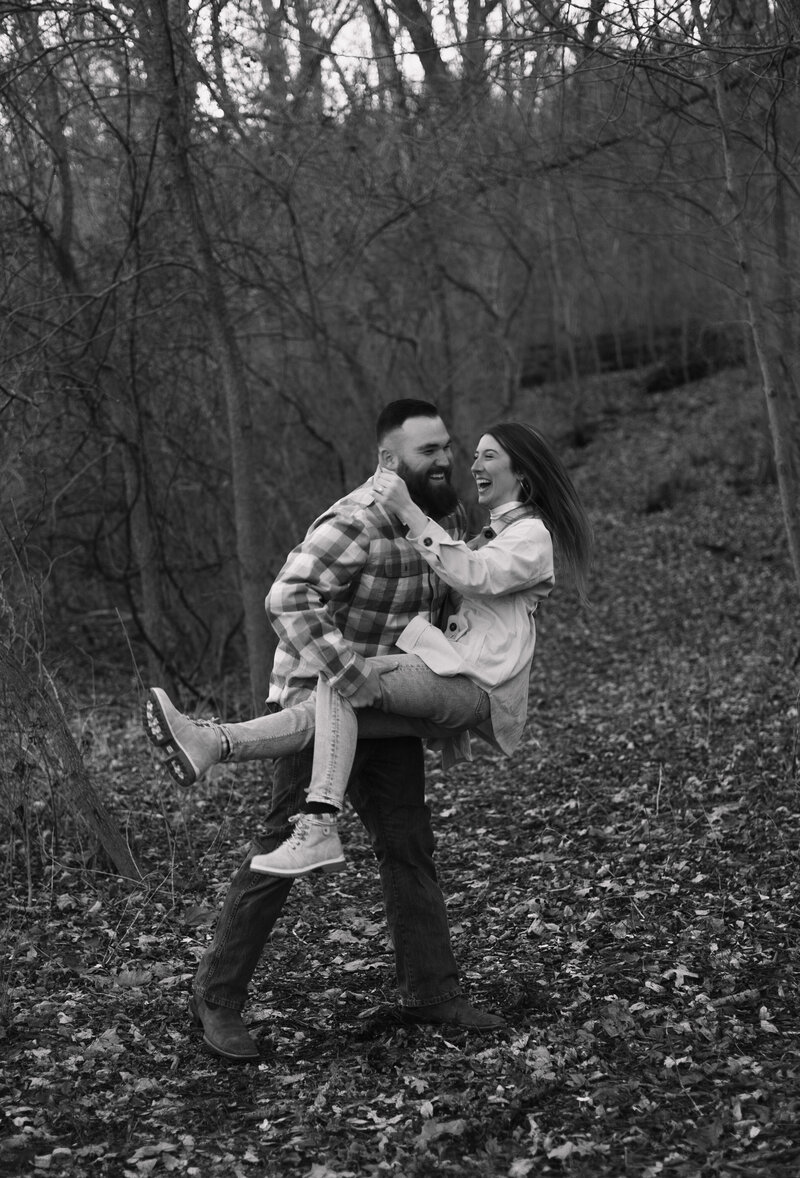 Black and white photo of an engagement session in Kansas City during the winter