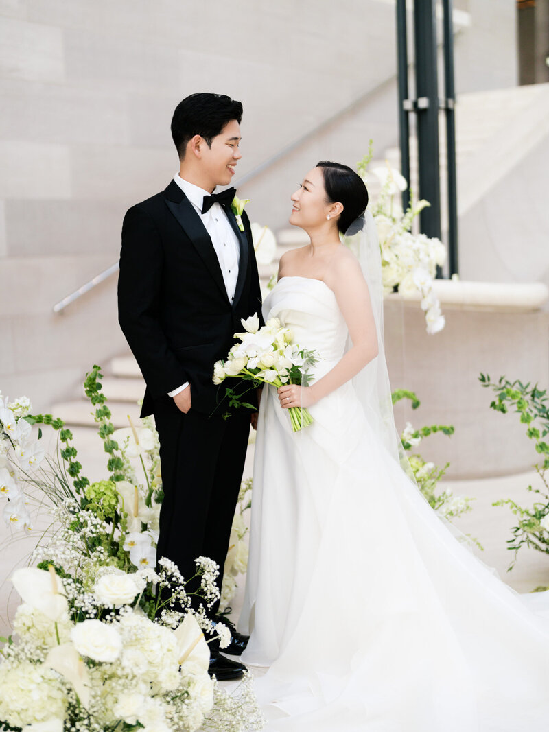 A couple standing at the alter 